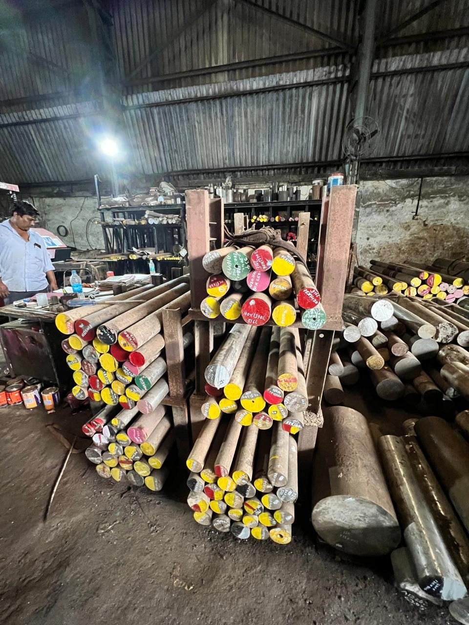 Round bar stock racked and stored at the JPS Metal & Alloys warehouse